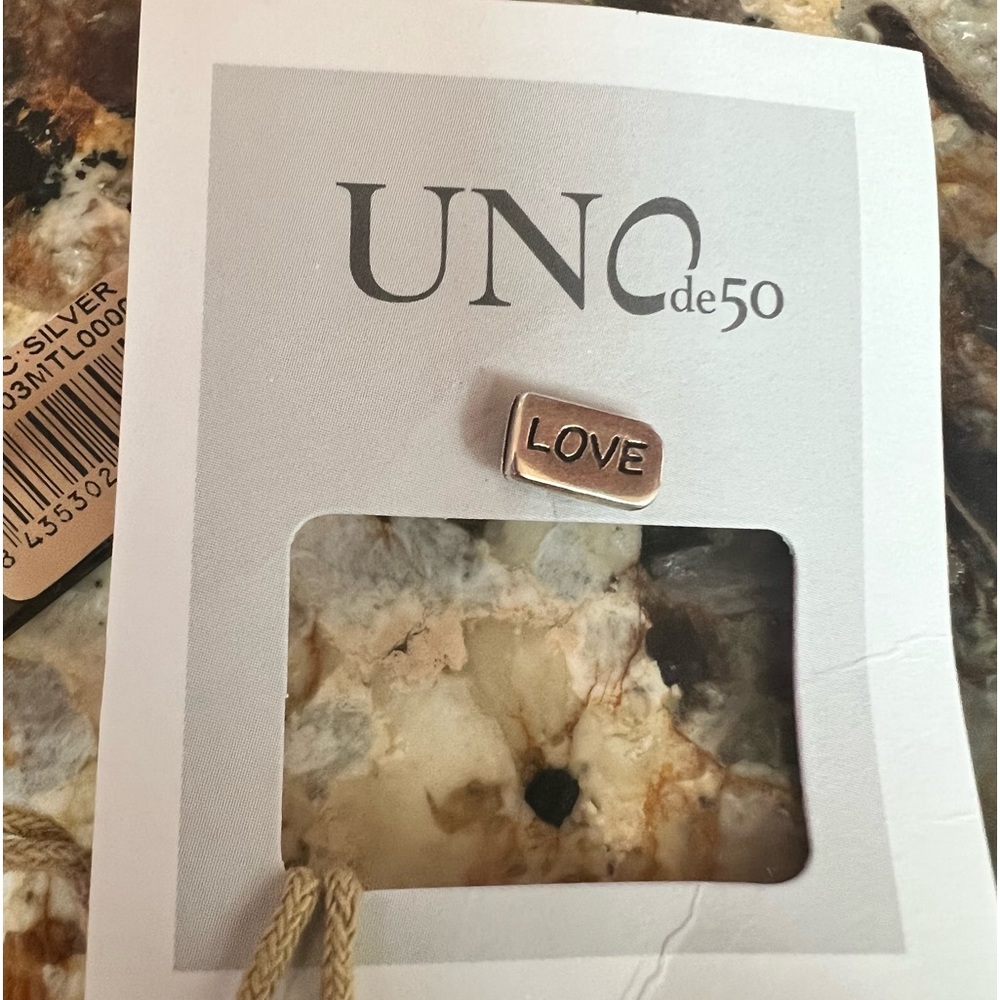 AUTHENTIC UNODE50 LOVE STUD PIERCING PIE0003MTL0000U